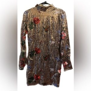 Rose gold sequin dress with butterfly and flower designs